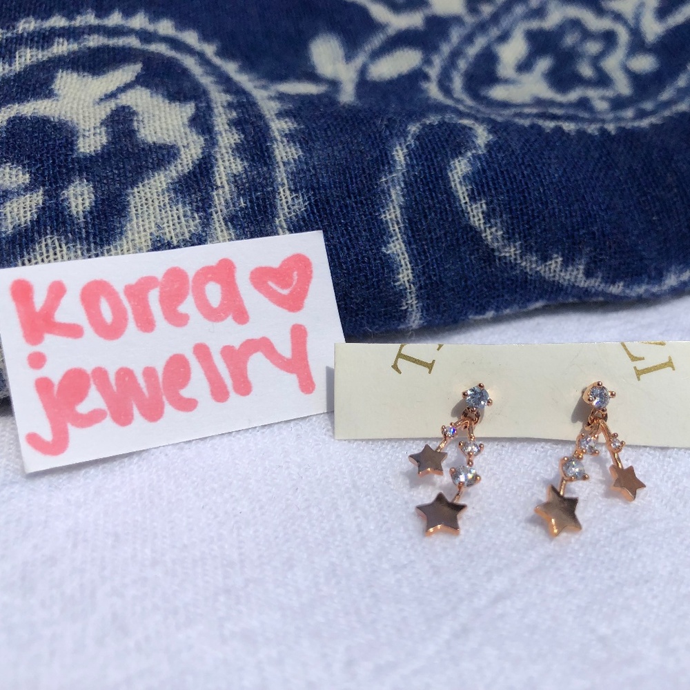 Rose Gold Dangly Star Earrings